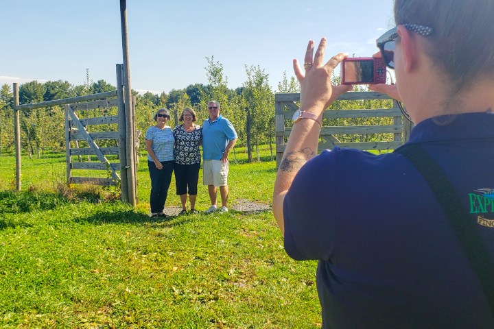 a man that is standing in the grass