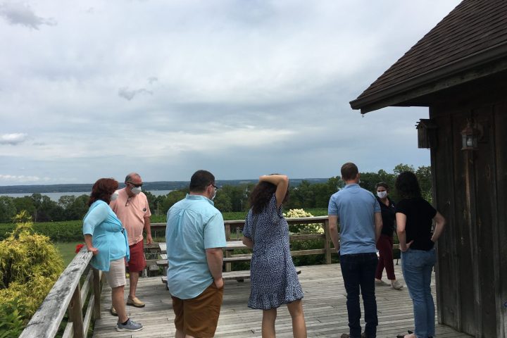 a group of people standing in front of a building