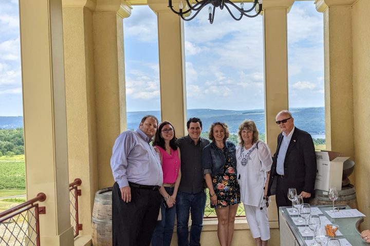 a group of people standing in front of a building
