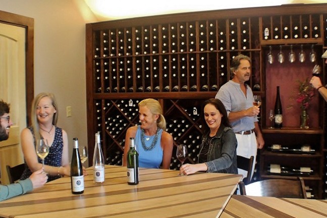 a group of people sitting at a table