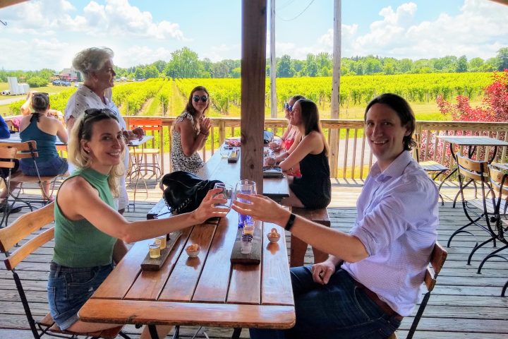 a group of people sitting on a bench