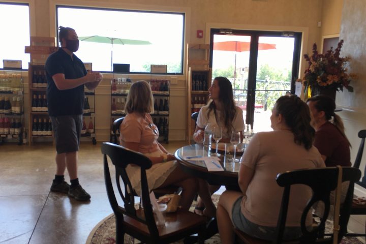 a group of people sitting at a table