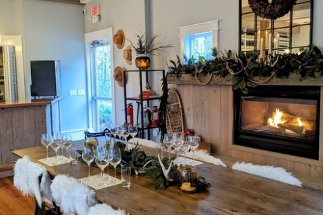 a living room filled with furniture and a fire place