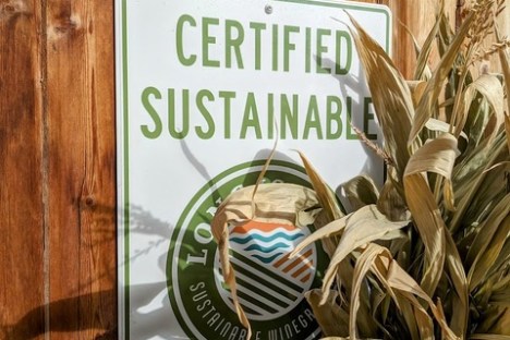 a sign on a wooden table