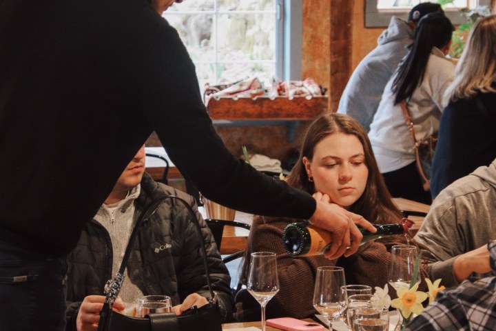 a group of people sitting at a table