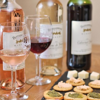 a close up of a bottle of wine on a table