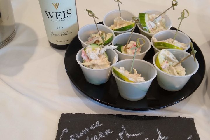 a plate of food and a cup of coffee on a table
