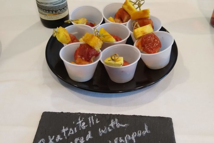 a plate of food and a cup of coffee