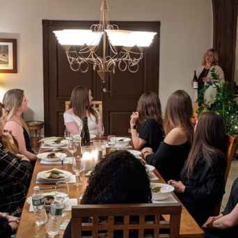 a group of people sitting at a table
