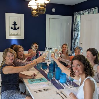 a group of people sitting at a table