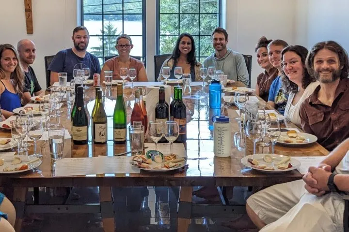 a group of people sitting at a table in a restaurant