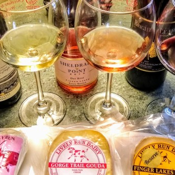 a table topped with glasses of wine
