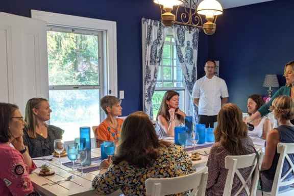 a group of people sitting at a table