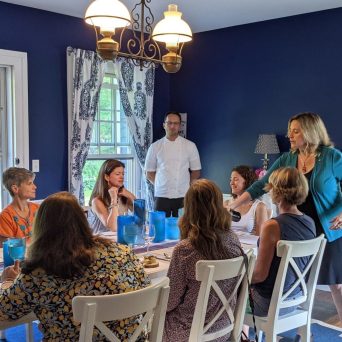 a group of people sitting at a table