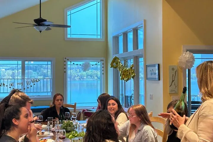 a group of people sitting at a table